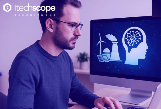 Man sitting next to computer screen